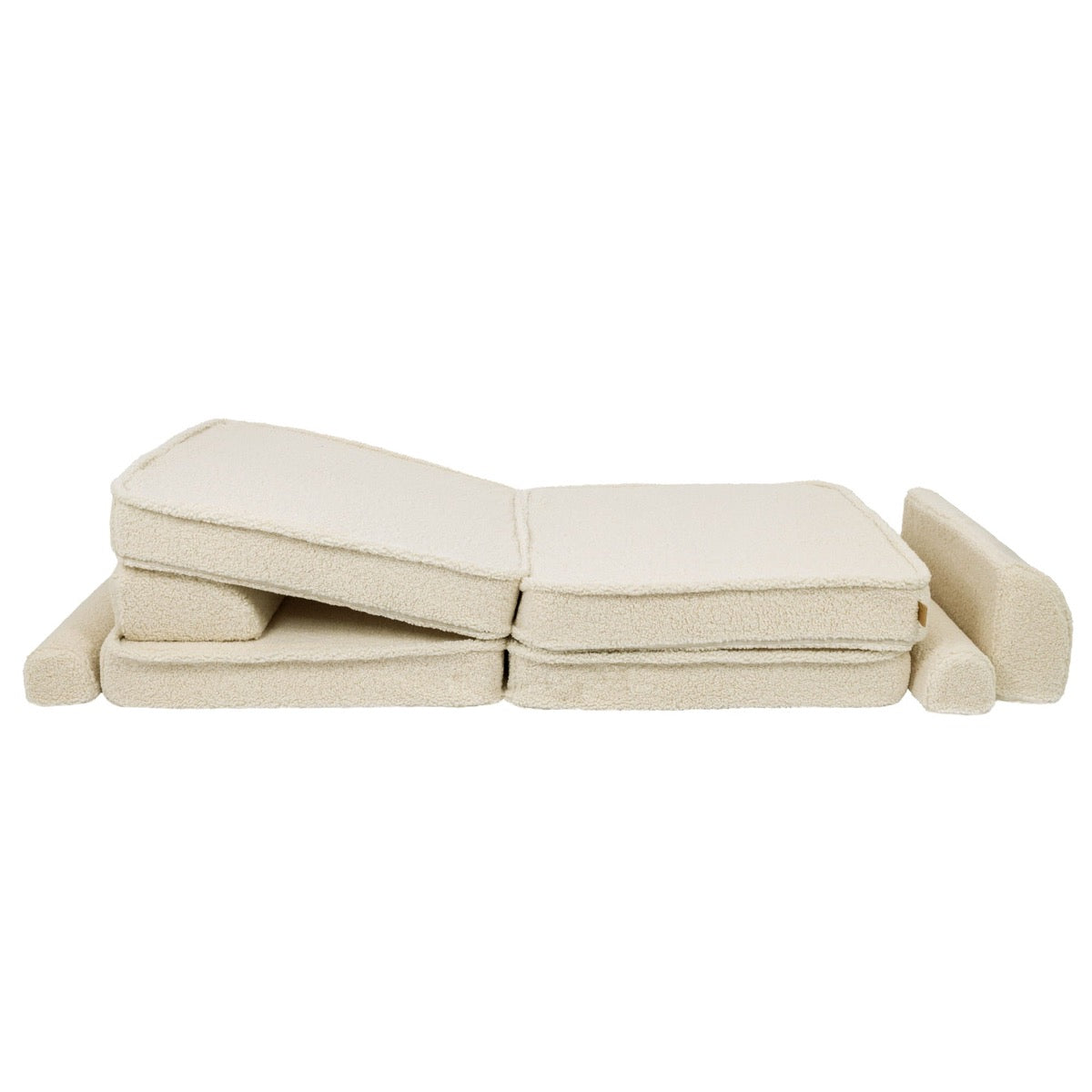 Bearly cream modular sofa in flat lounge configuration showing stacked cushions and side supports