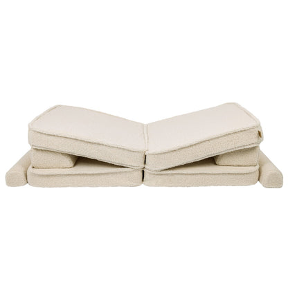 Bearly cream modular sofa in angled V-shape configuration with cushions and armrests