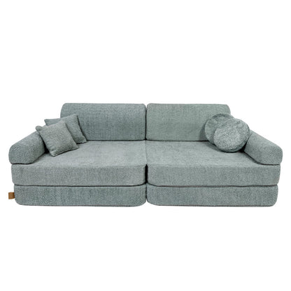 Fresh mint boucle modular sofa front view with cushions and round bolster pillows