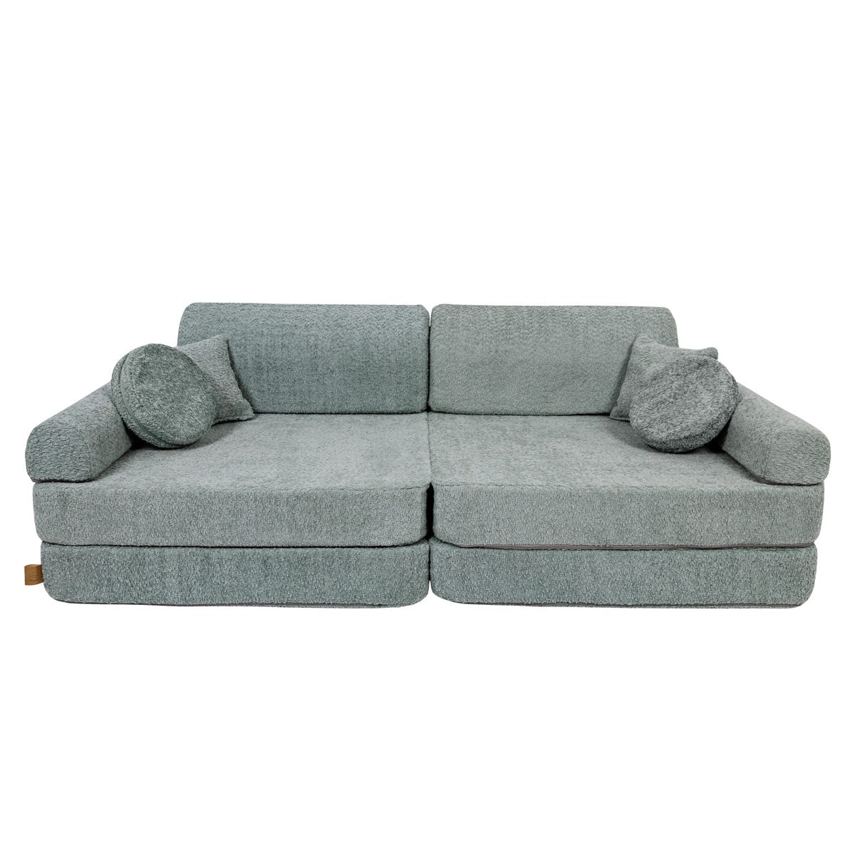 Fresh mint boucle modular sofa in lounge position with bolster pillows