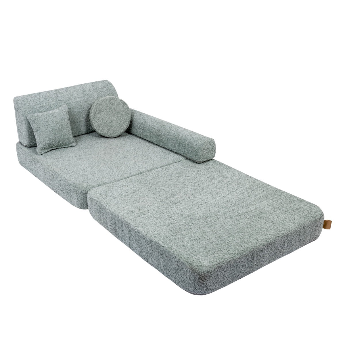 Modular sofa converted to lounger bed position with extended footrest