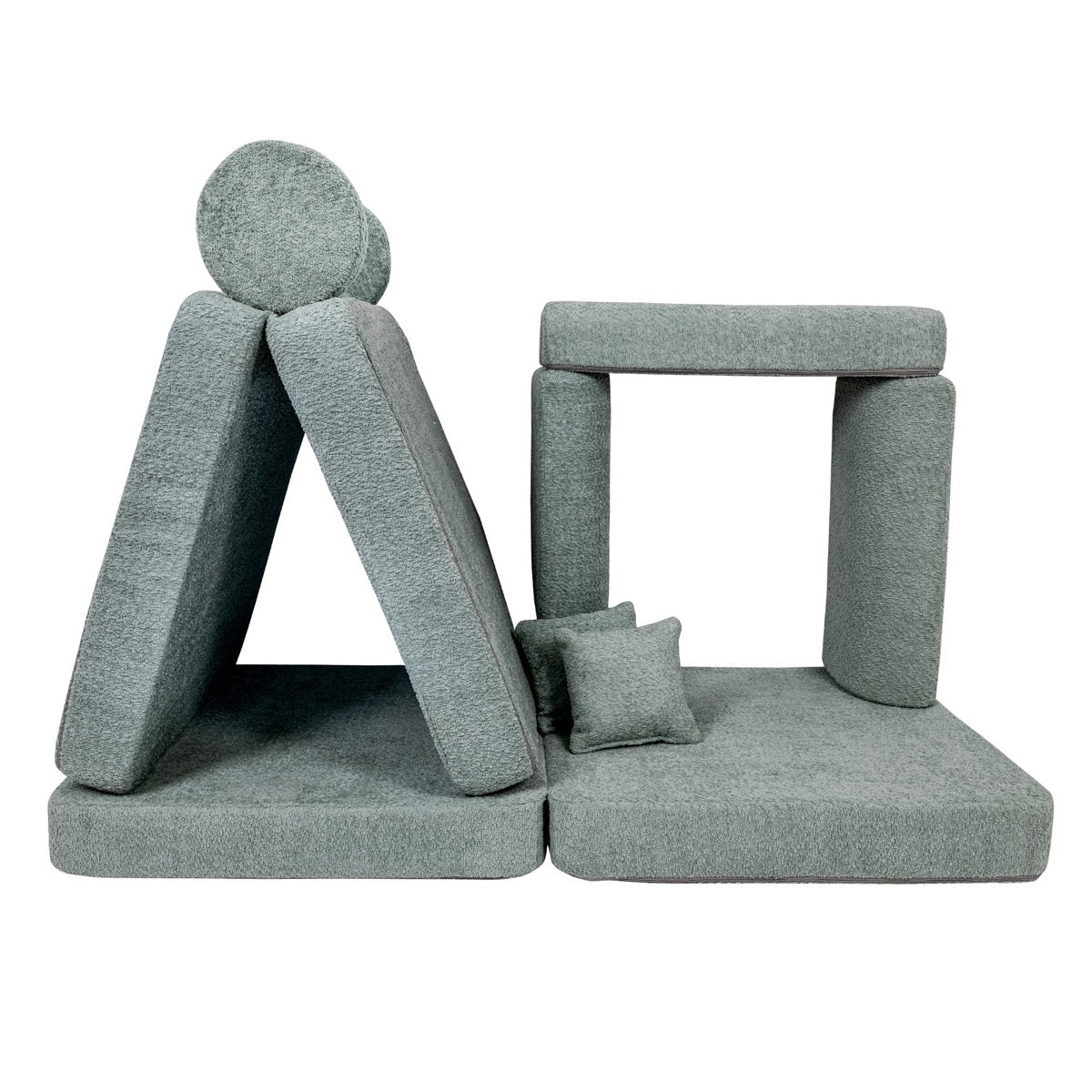 Soft boucle foam building blocks separated from sofa for floor play
