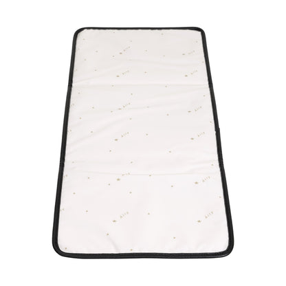 Cream-colored quilted changing pad included with espresso diaper backpack