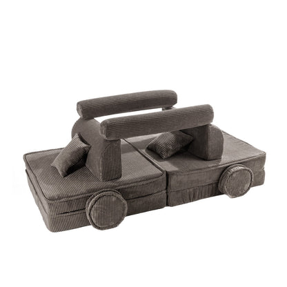 Brown corduroy modular sofa modules reconfigured into car-shaped play structure