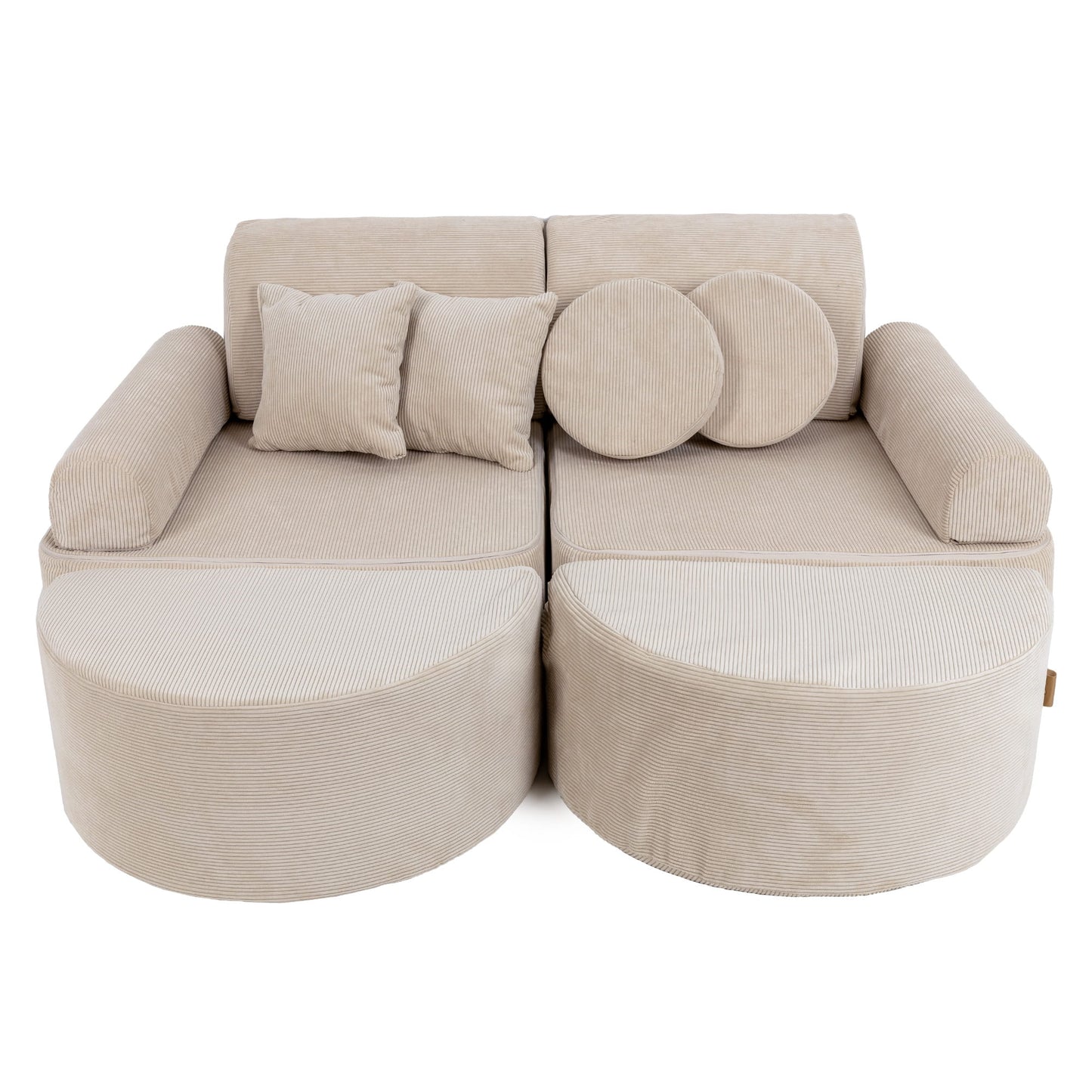 Medium modular kids sofa in ecru slimcord with two curved seats, cylindrical bases, and round accent pillows