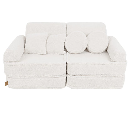 Bearly cream modular sofa front view with rounded back pillows and rectangular cushions