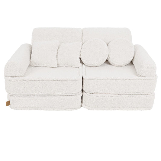 Bearly cream modular sofa front view with rounded back pillows and rectangular cushions