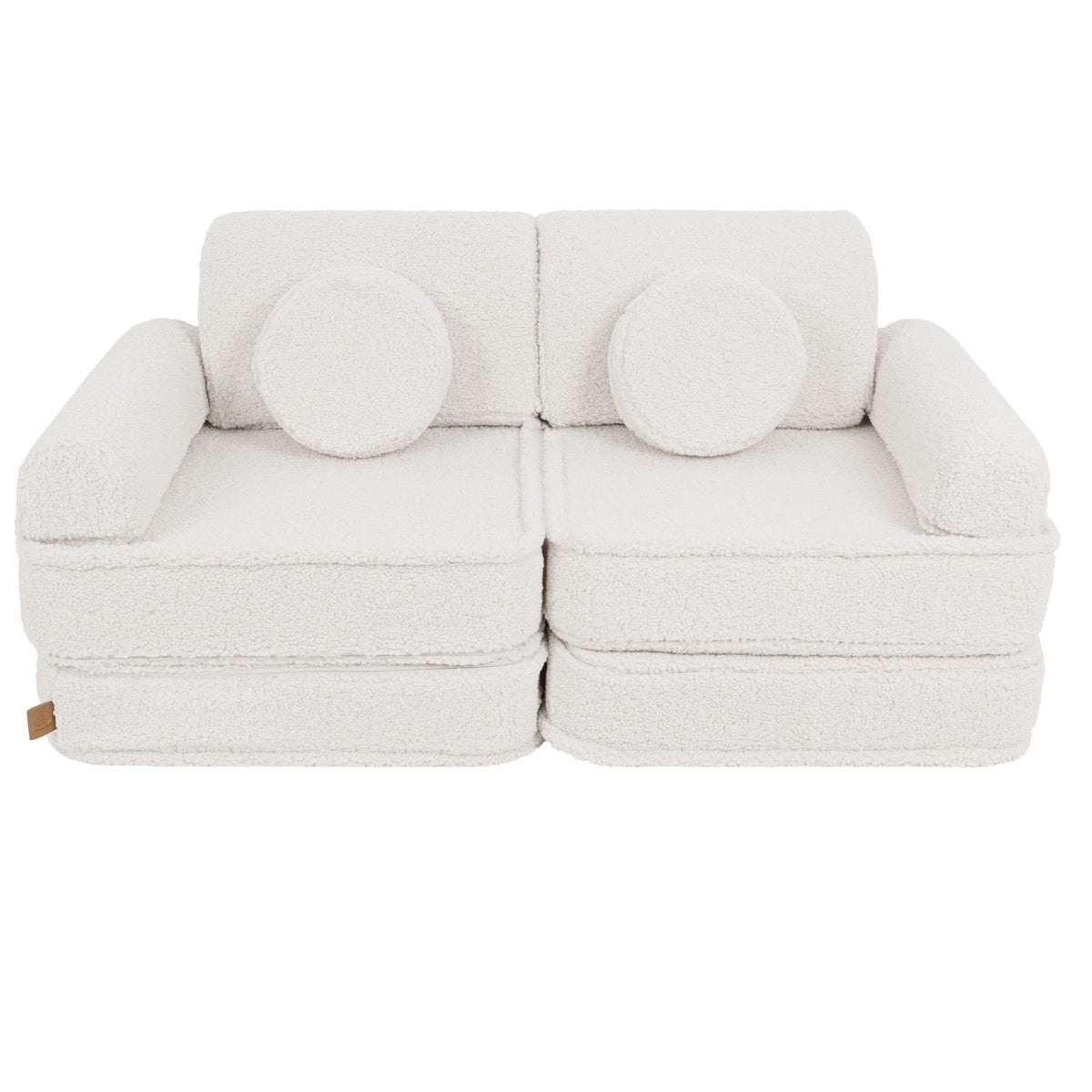 Bearly cream modular sofa front view with two round bolster pillows as backrest