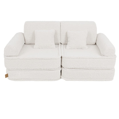 Bearly cream modular sofa front view with rectangular cushions stacked as backrest