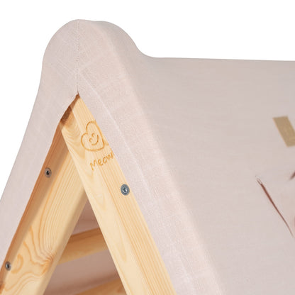 Close-up of natural wood ladder with pink tent cover and MeowBaby heart logo