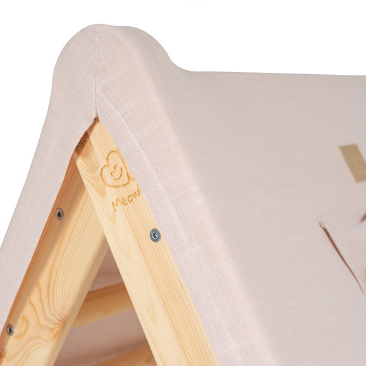 Close-up of natural wood ladder with pink tent cover and MeowBaby heart logo