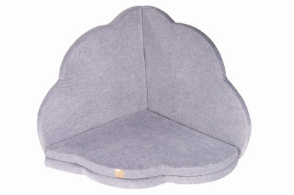 Interior view of grey cloud shaped play mat displaying hollow sleeping nest design