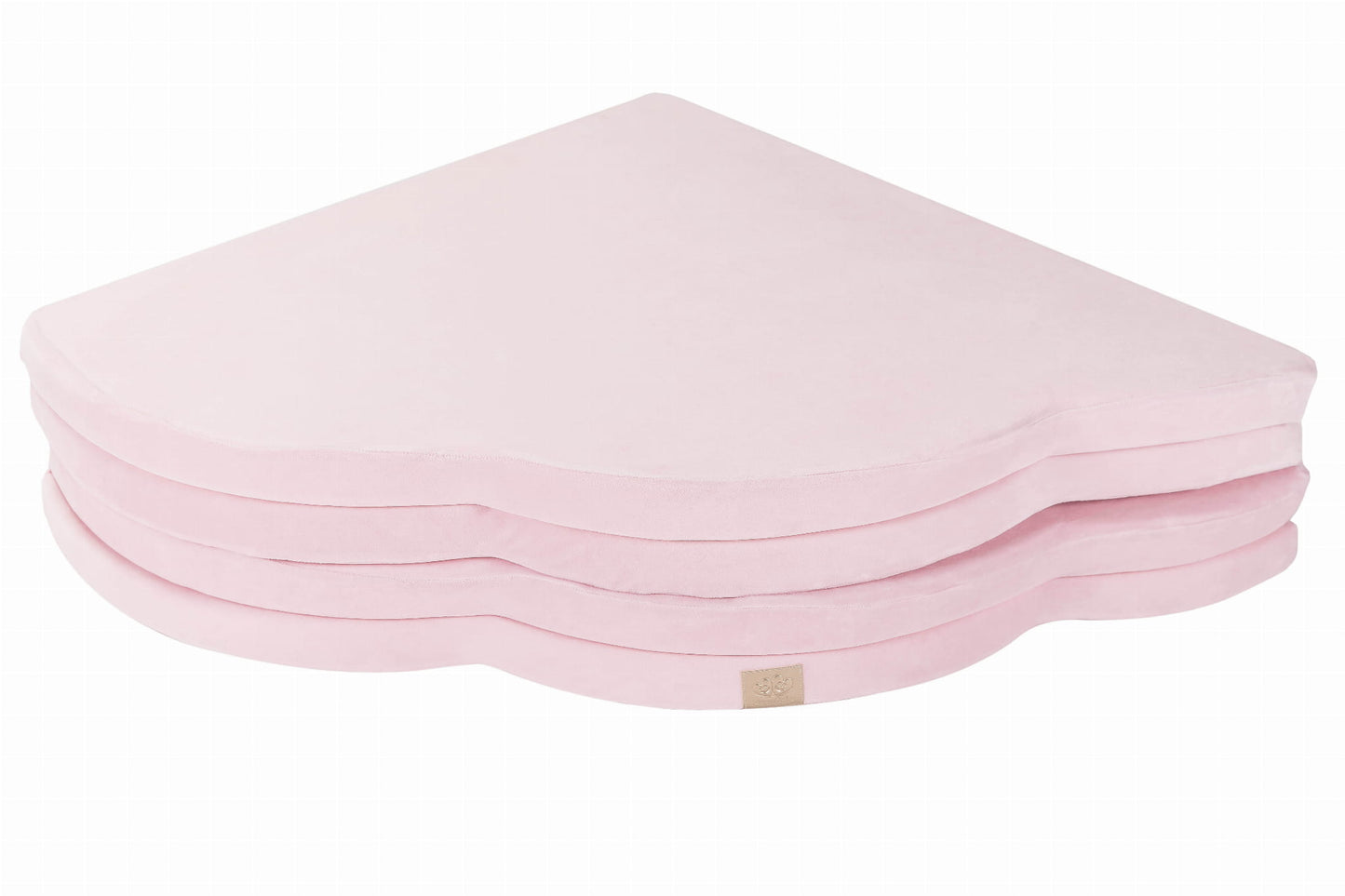 Side angle of stacked pink cloud play mat layers showing thickness