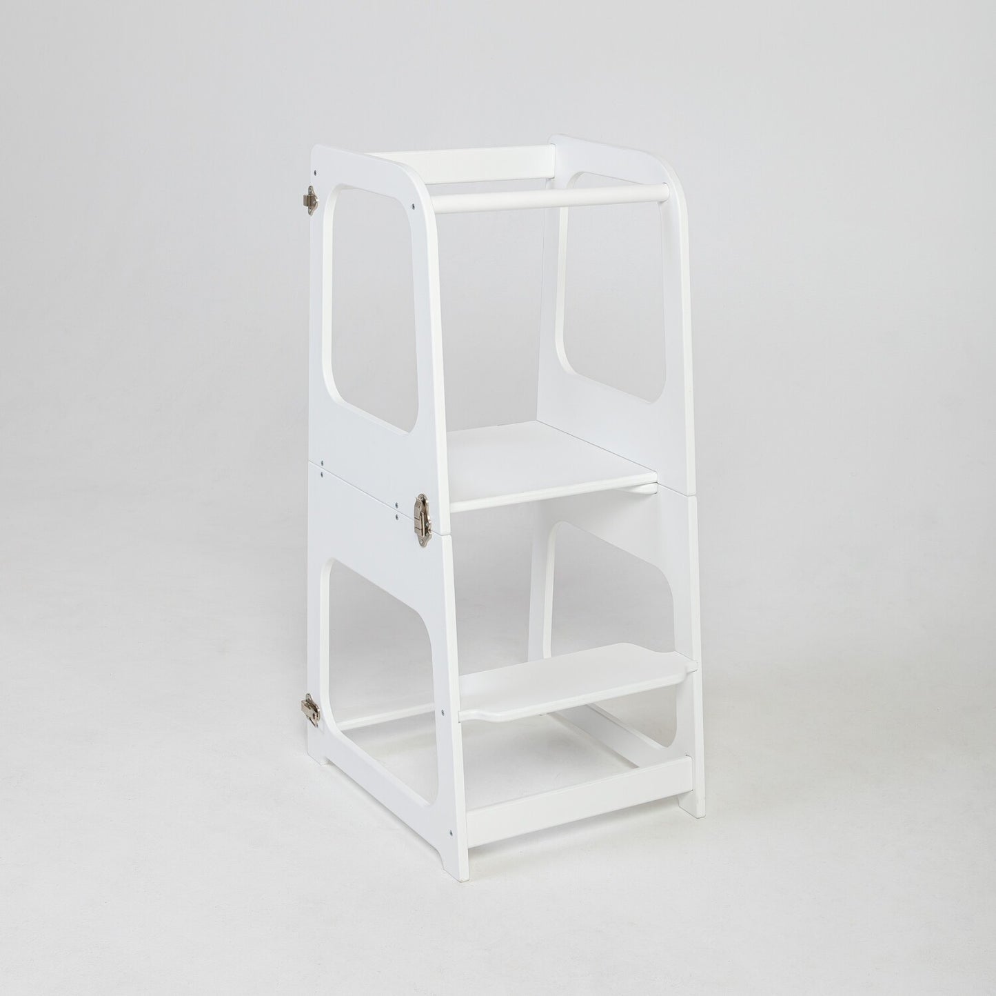 White Montessori kitchen tower in upright position with three shelves