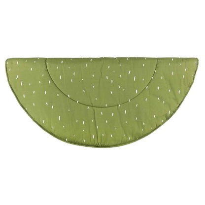 Underside view of green organic cotton play mat with embroidered details and curved edges