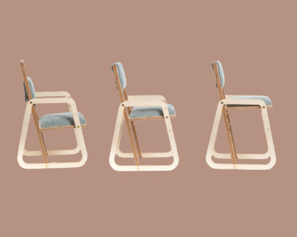 Three Montessori chairs displayed from back view showing stackable design