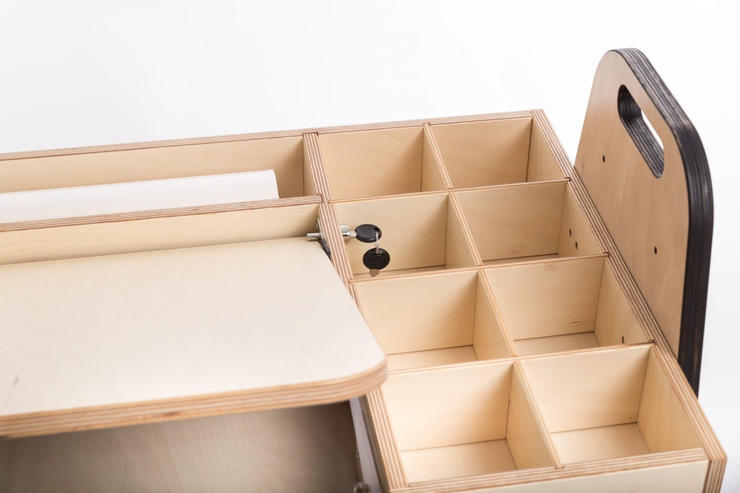 Side view of Montessori table showing transparent acrylic board and compartments