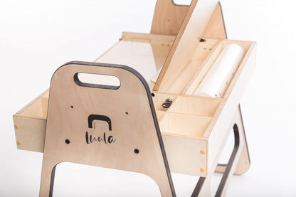 Montessori table with paper roll dispenser and organized supply compartments