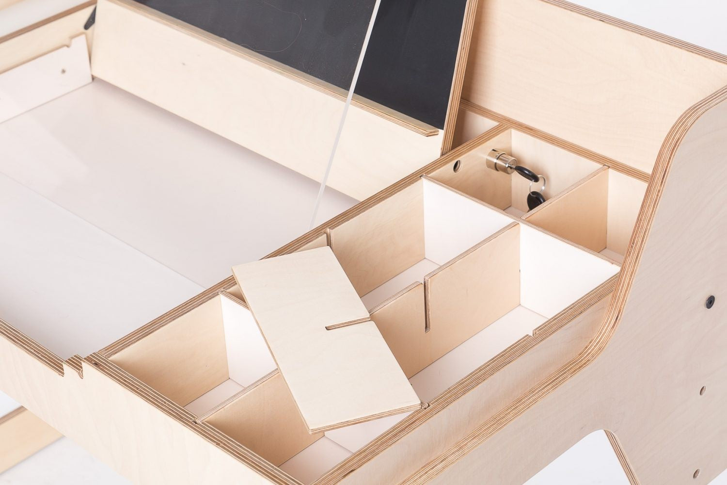 Interior storage compartments and dividers in birch plywood Montessori table for organizing materials