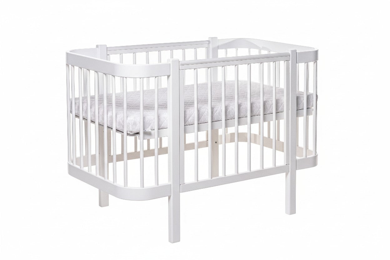 White KOTTO ELIN crib with both side panels removed for full toddler bed setup
