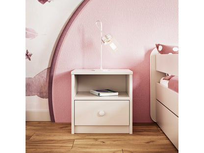 White Babydreams bedside table in pink kids' bedroom with open shelf and drawer