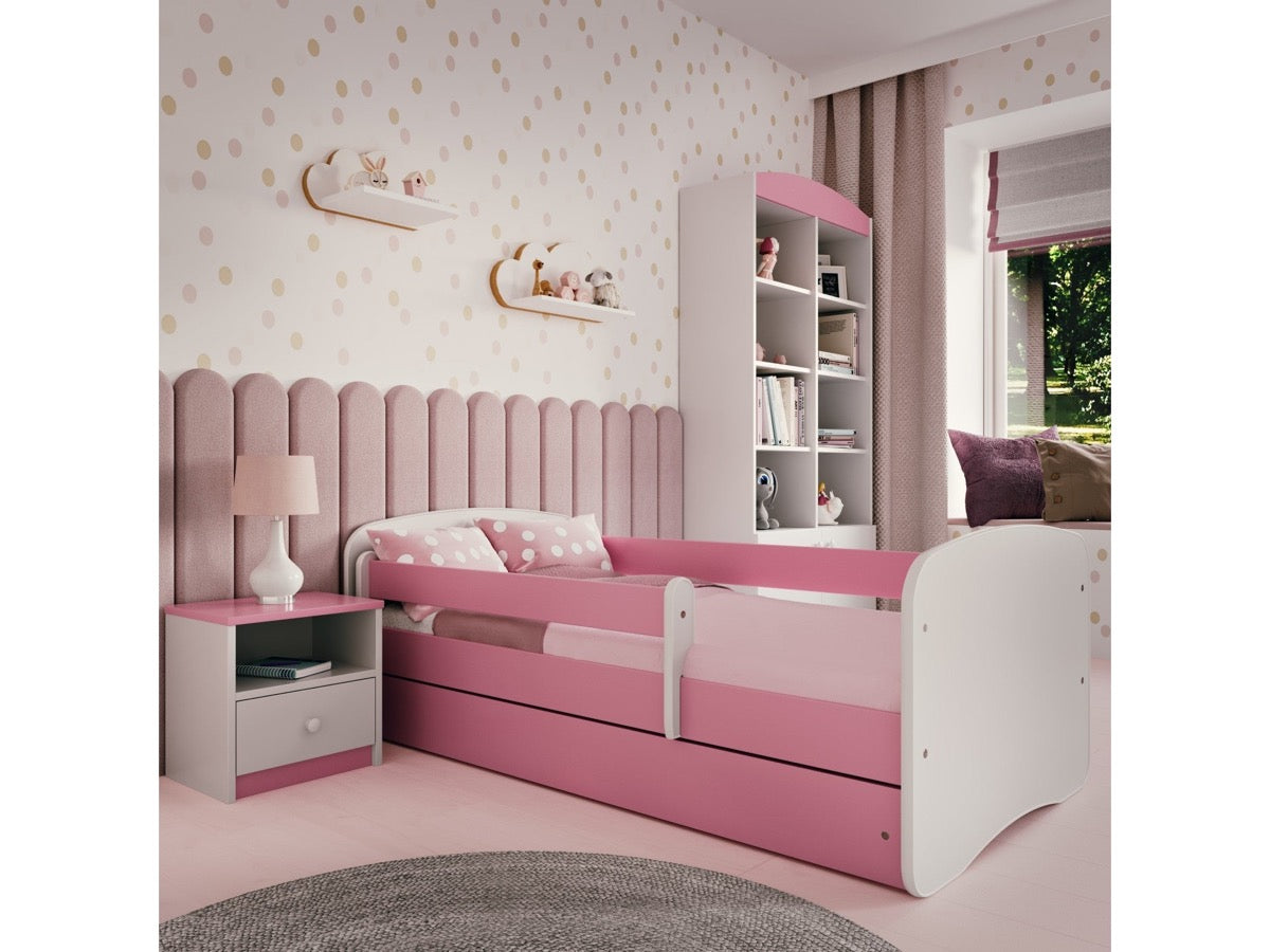 Babydreams bedside table in pink kids' bedroom next to Babydreams bed