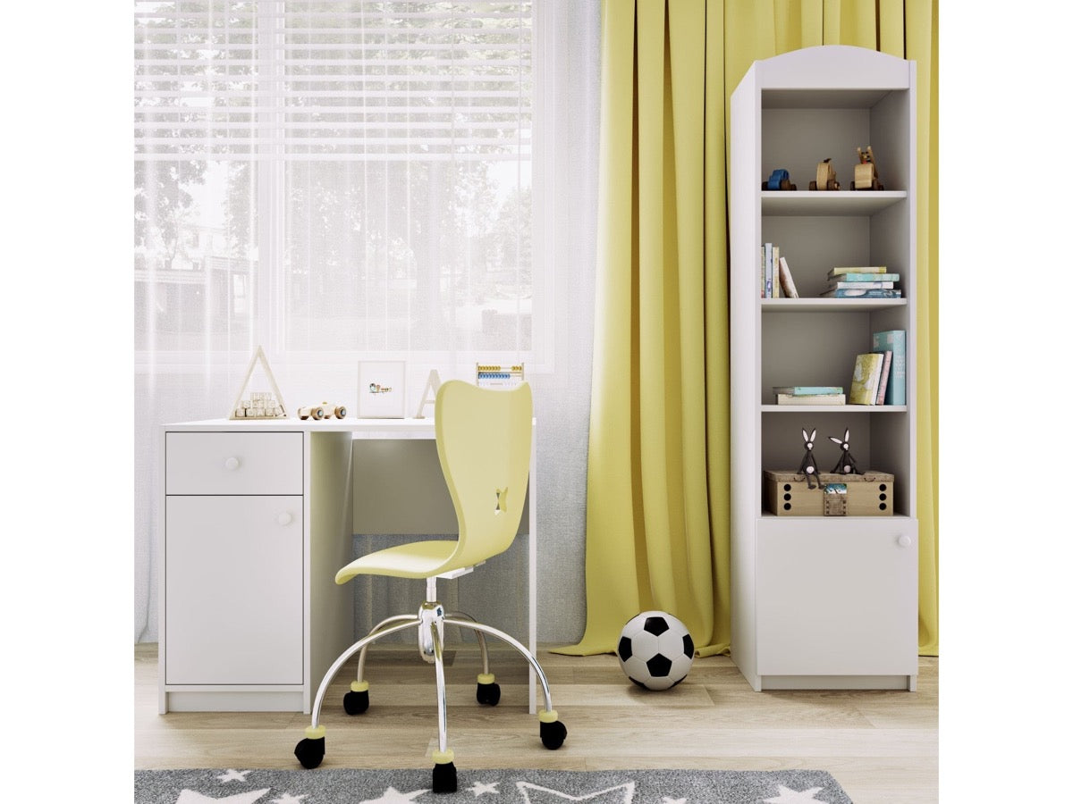 White and yellow kids shelf in study area next to desk with chair and toys