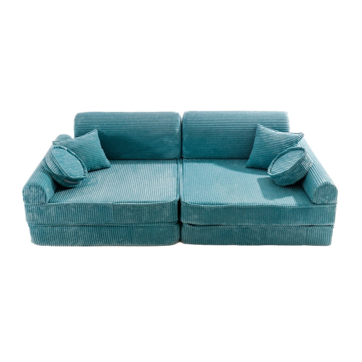Turquoise corduroy modular sofa top view with two seats, throw pillows, and cylindrical cushions