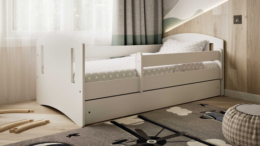 White and beige children's bed in modern bedroom with toys and decor