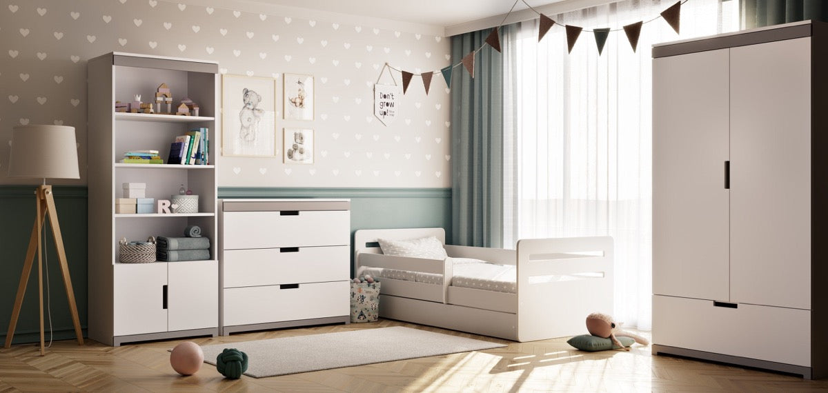 White Tomi children's bed displayed in modern nursery with matching furniture