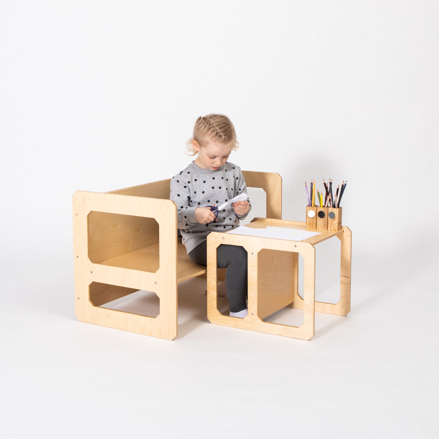 Montessori birch table and chair set showing open storage compartments