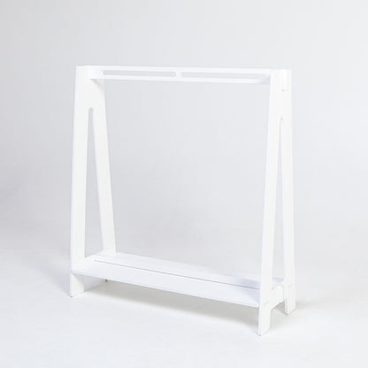 White birch plywood toddler clothing rack, front view showing frame and storage shelf