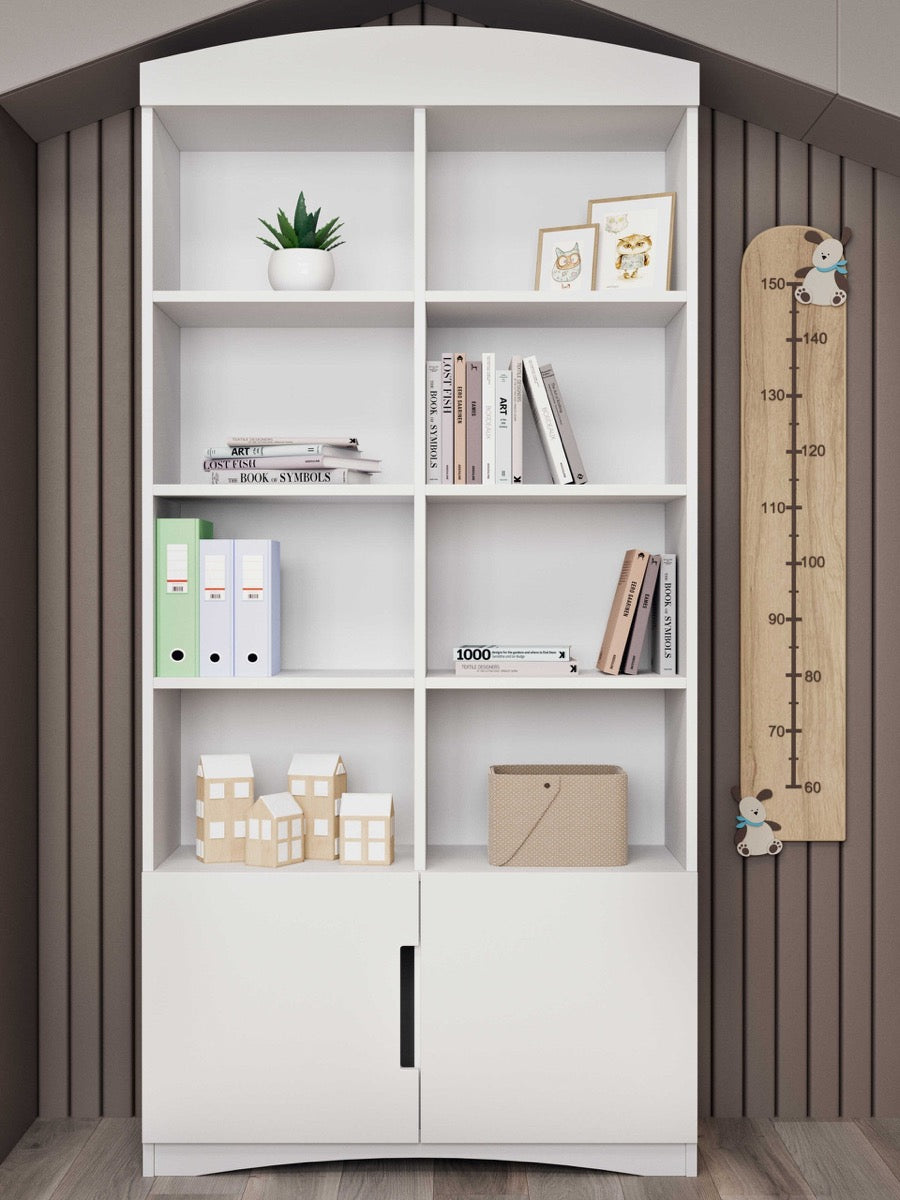 White double bookshelf in nursery corner with height growth chart and storage baskets