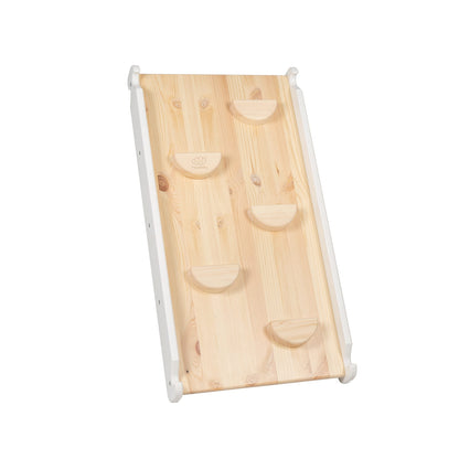 Natural wood climbing wall panel with curved grip handles and white frame