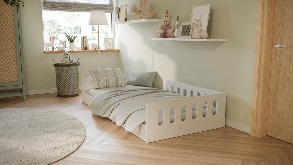 White Timon floor bed styled with bedding in bright nursery room setting