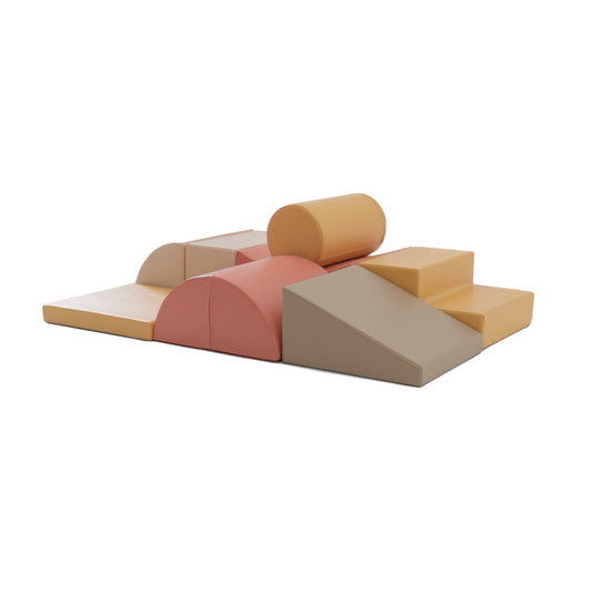 IGLU soft play foam block set arranged in pastel pink, beige, and gray colors for imaginative play