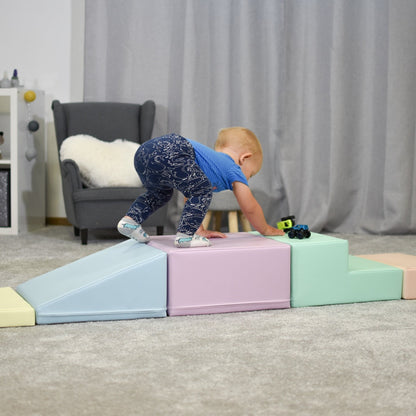 Child balancing on connected foam blocks in various pastel colors