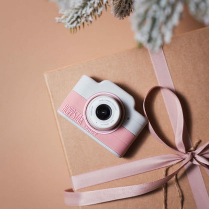 Aparat foto pentru copii Hoppstar Expert Blush pe un cadou cu fundă roz