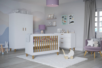 Kocot Kids Baby Bed Kubi White Scandinavian Crib – side angle view nursery white crib | Nestling