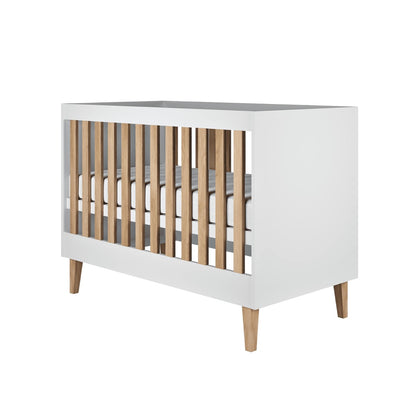 Kocot Kids Baby Bed Kubi White Scandinavian Crib – lifestyle shot baby cot in nursery room | Nestling