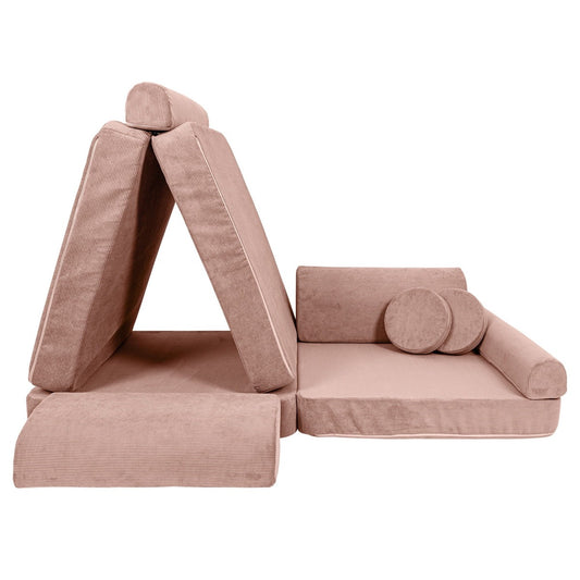 Pink modular sofa pieces separated showing A-frame tent, base platform, and cylindrical bolster cushions