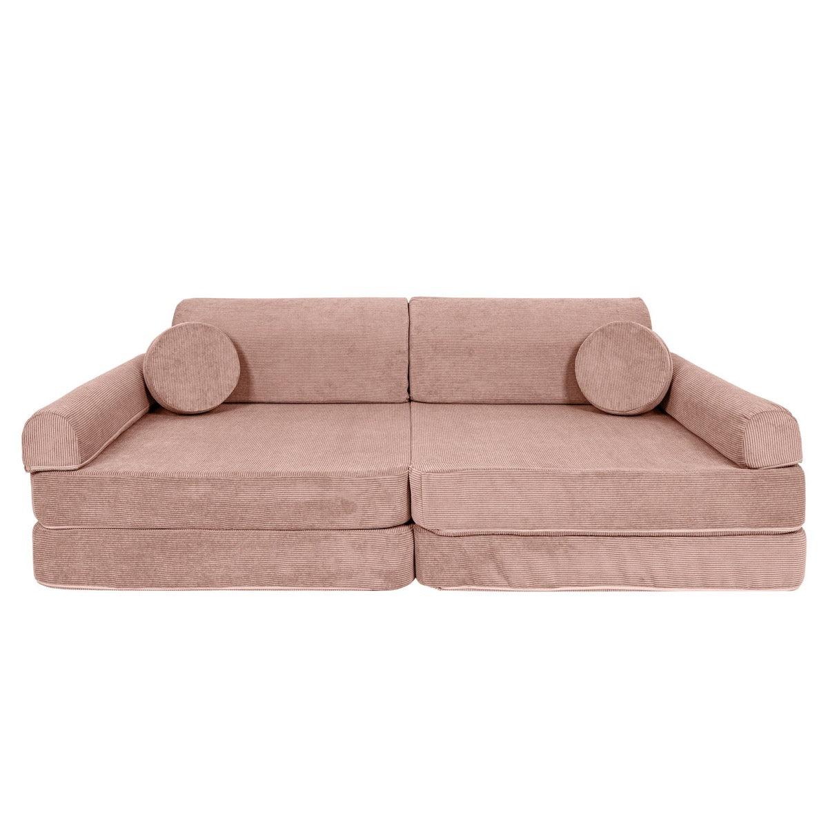 Pink slimcord corduroy modular sofa in couch form with cylindrical arm supports