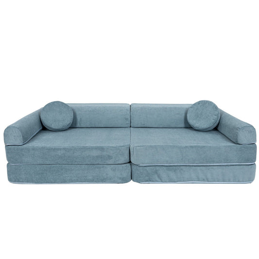 MeowBaby modular sofa in turquoise slimcord, front view with two cylindrical pillows