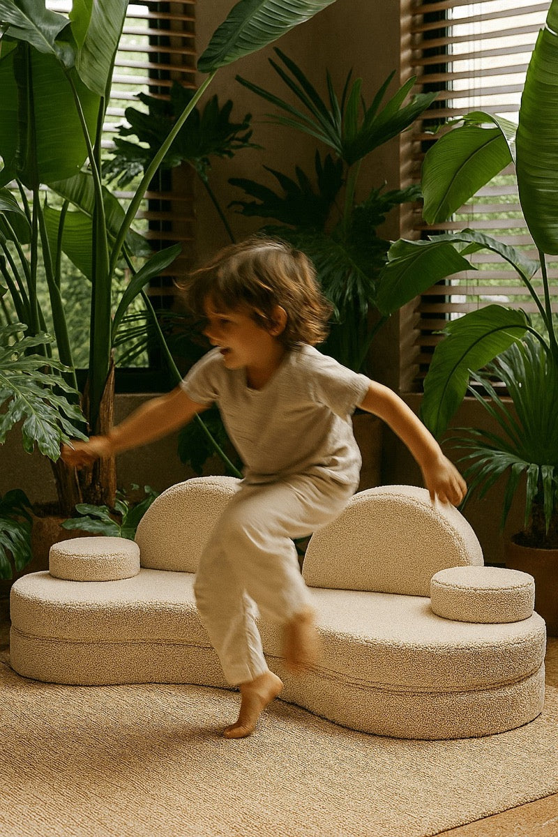MeowBaby Modular Sofa Coccolo 6-Piece Kids Foam Sofa – child climbing on bearly off-white coccolo sofa | Nestling
