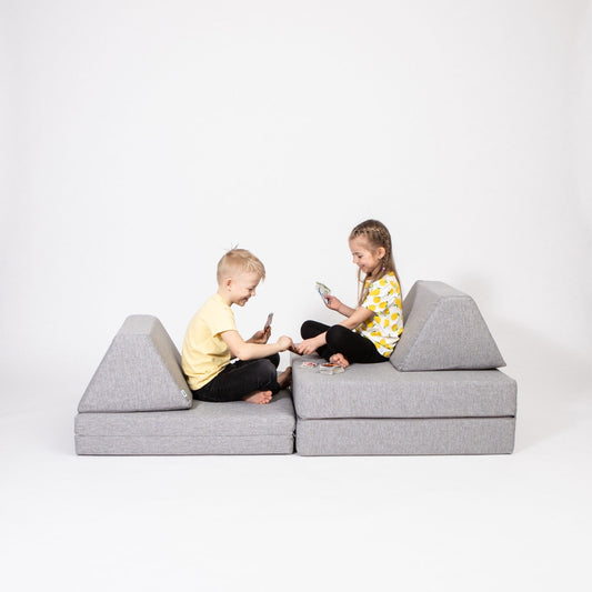 Monboxy Activity Play Mattress Set Grey Foam Sofa – children playing on grey modular sofa | Nestling