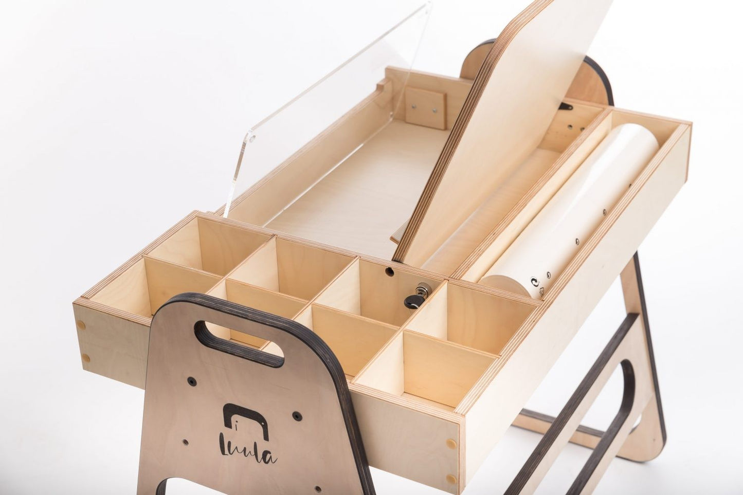Open storage tray showing organization compartments and rolling paper dispenser detail