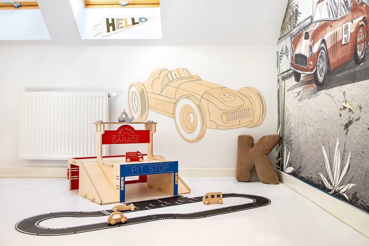 Complete wooden retro car wall decoration installed with matching garage playset and track