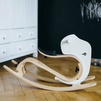 Rocking elephant add-on assembled showing curved rockers and natural wood construction