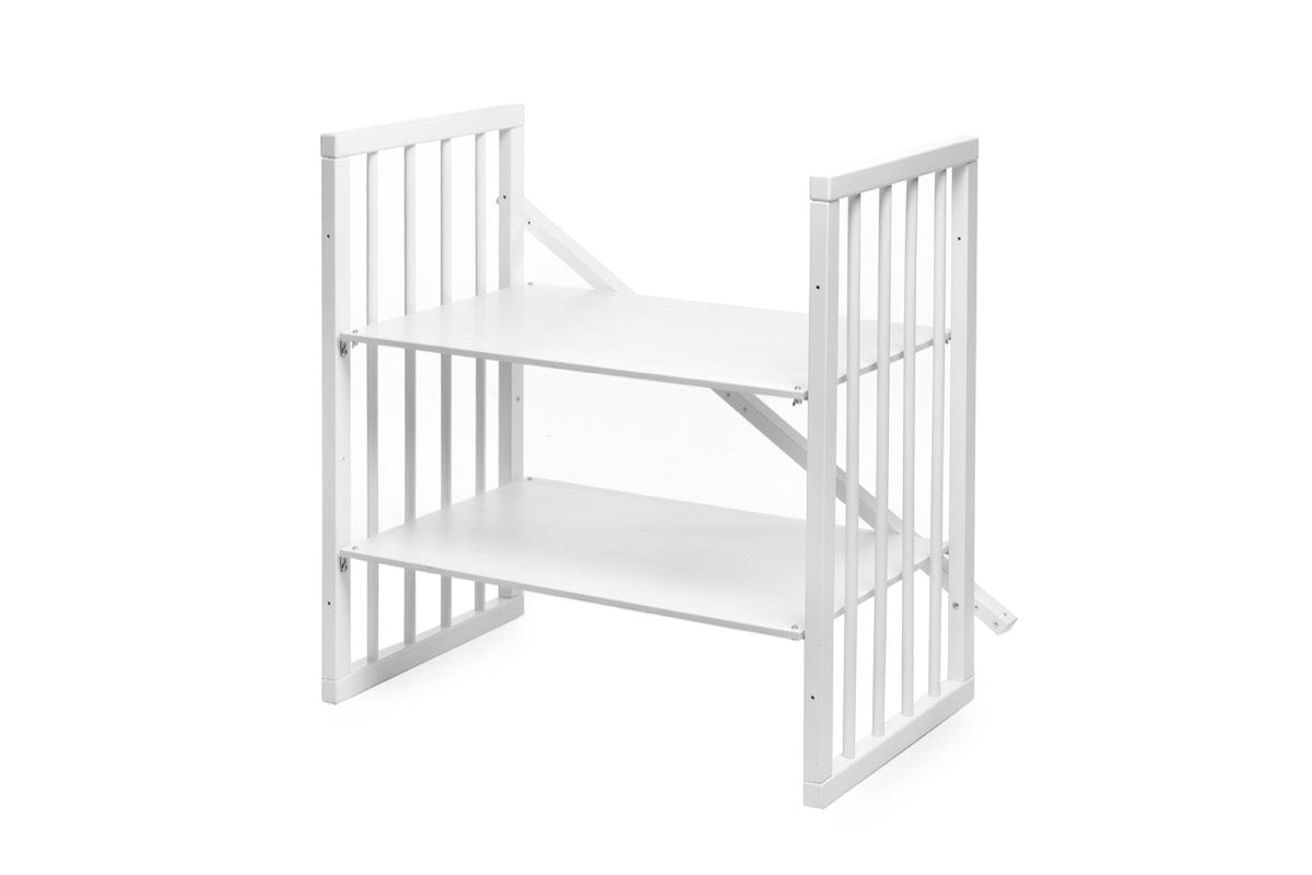 White beech wood round crib converted to bedside sleeper with lowered gate and two mattress levels