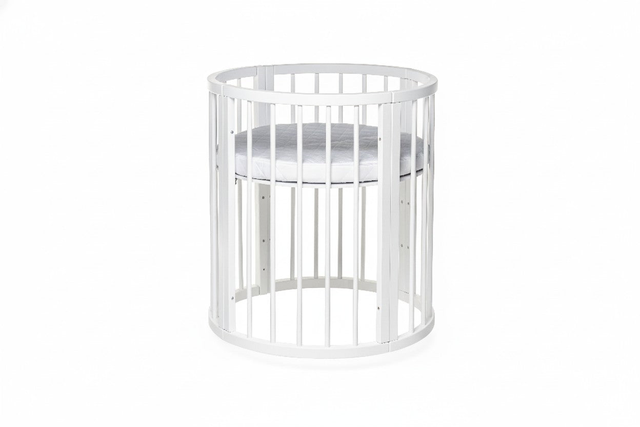 White round baby crib OLIN compact size view with single mattress level for newborns